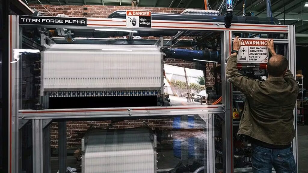 Prometheus Fuels Titan Forge Alpha electrochemical reactor unit converting atmospheric CO2 into zero-net-carbon synthetic fuel inside a commercial production facility